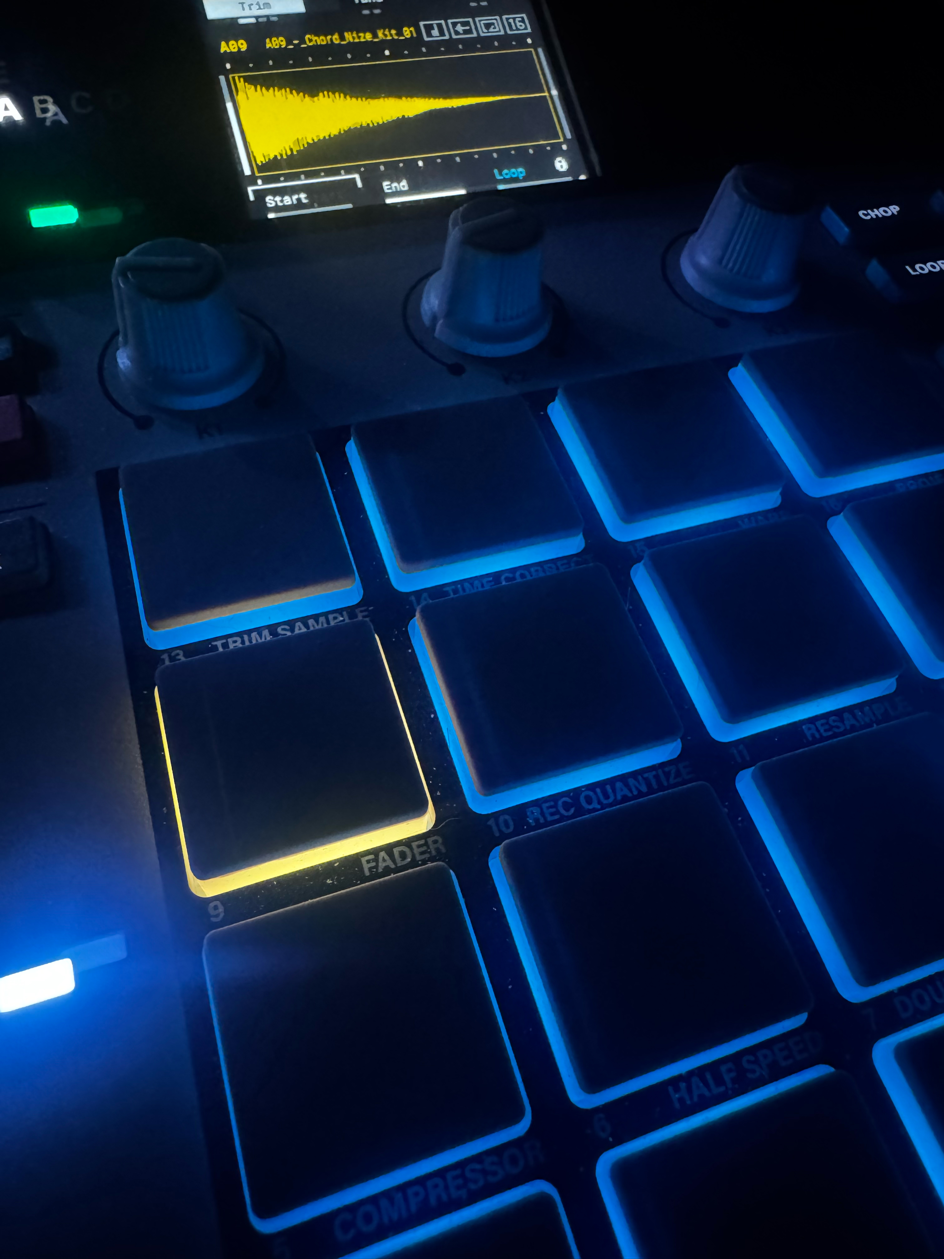 MPC pads lit up, close-up